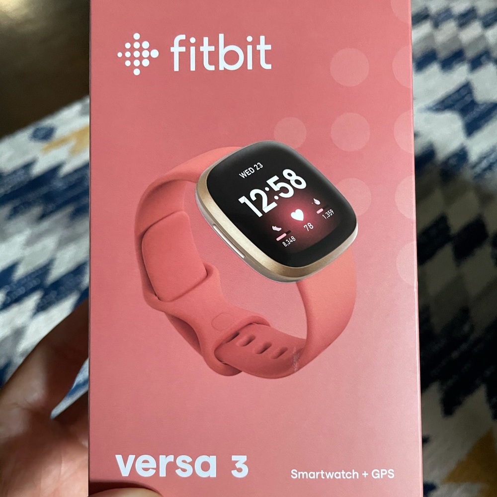 New Fitbit Versa 3 in gold/pink